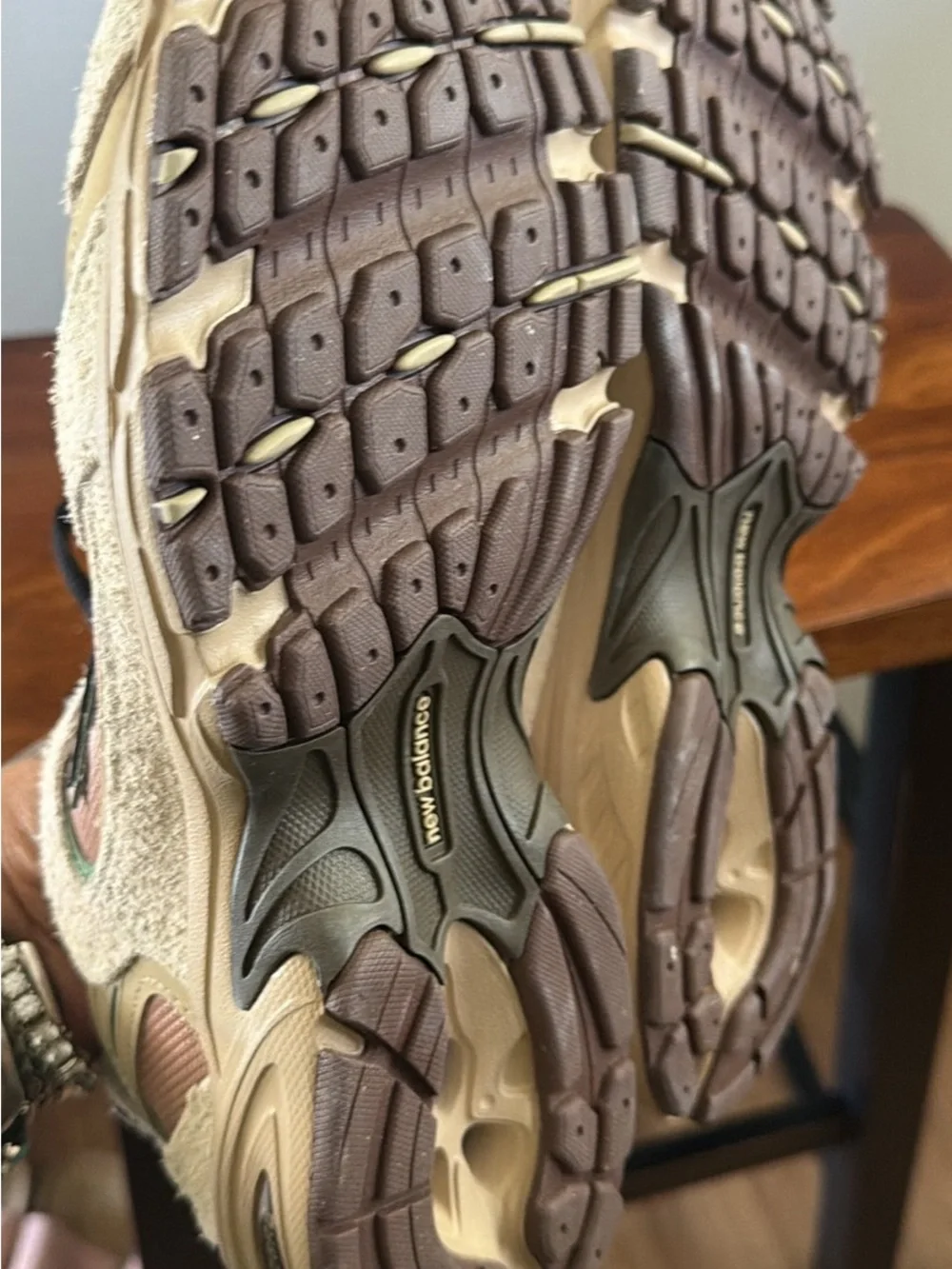 New Balance Beige and Black Accent Sneakers